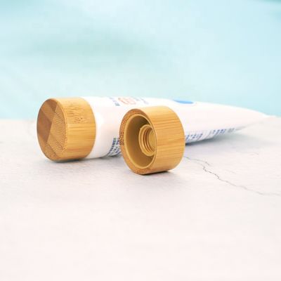 Горячая продавая крышка бамбуковой крышки завинчивой пробки ISO2000 изготовленная на заказ косметическая бамбуковая для трубки